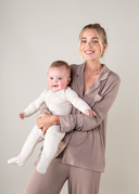 Ribbed Bamboo Baby Sleepsuit in Cream | PLUSH